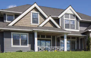 Fiber Cement Siding in Grey Color on a multi-texture home. LP Siding is featured.