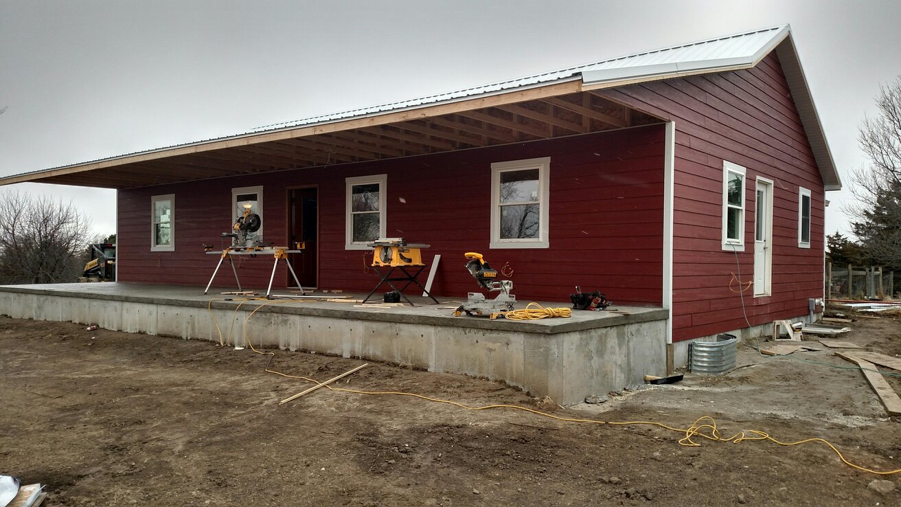 Siding Replacement Using Prefinished Smart Shield Siding from Sprenger Midwest in Cinnabar